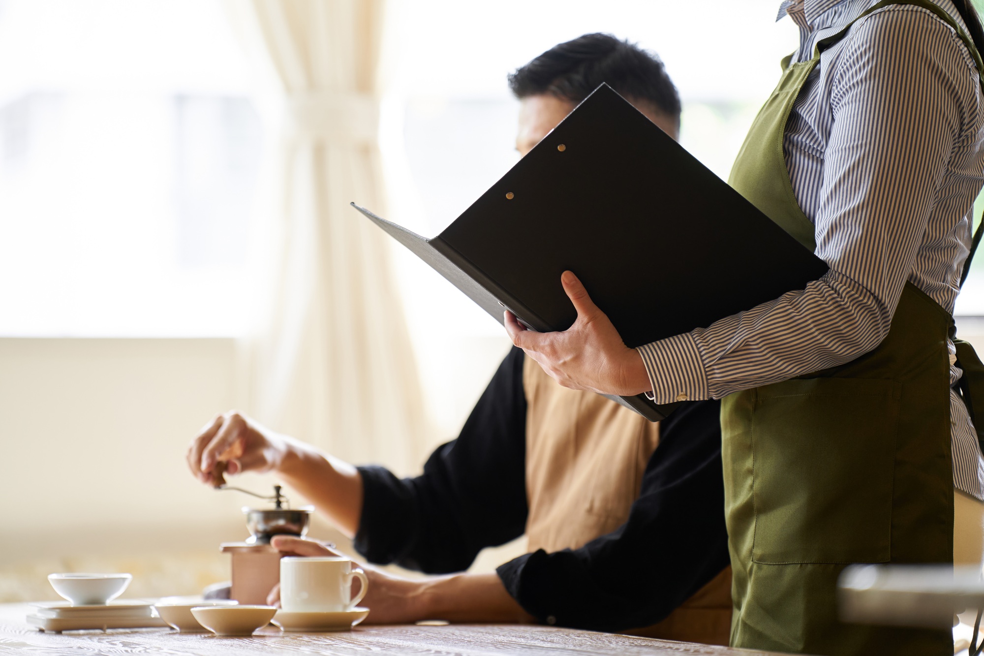 Asian restaurant managers conducting training